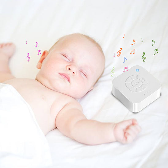veilleuse-bruit-blanc-avec-lumière-sur-lit-avec-musique-bébé-dort
