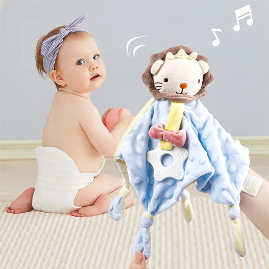 bébé regarde son doudou bébé 