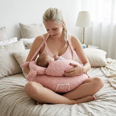 Coussin allaitement rose pour  confort maman et bébé