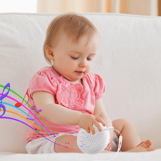 Bébéb joue avec la machine a bruits blancs, fabriquée en ABS et silicone, sans BPA, sûre et durable pour un usage quotidien