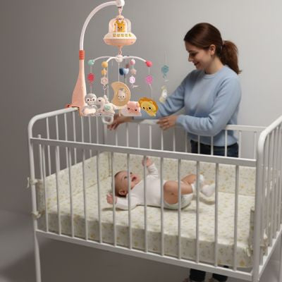 mobile lit bébé musical et lumineux maman avec bébé dans son berceau
