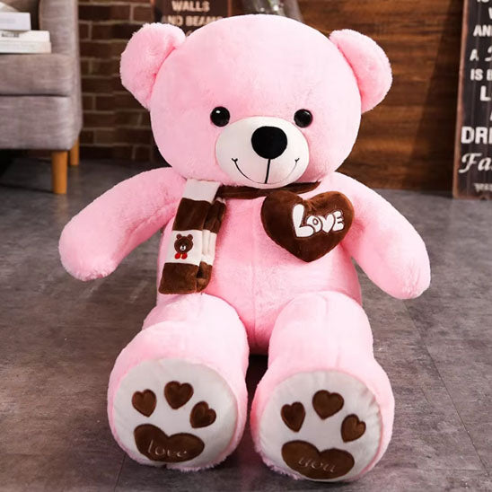 ours-en-peluche-rose-avec-écharpe-cœur-écrit-love