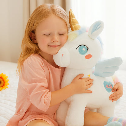 Peluche licorne rose et bleu douceur magique pour apaiser les cauchemars