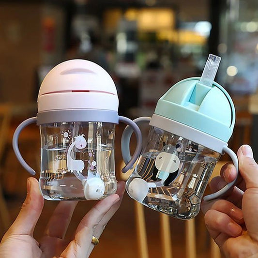 Tasse d'apprentissage avec paille